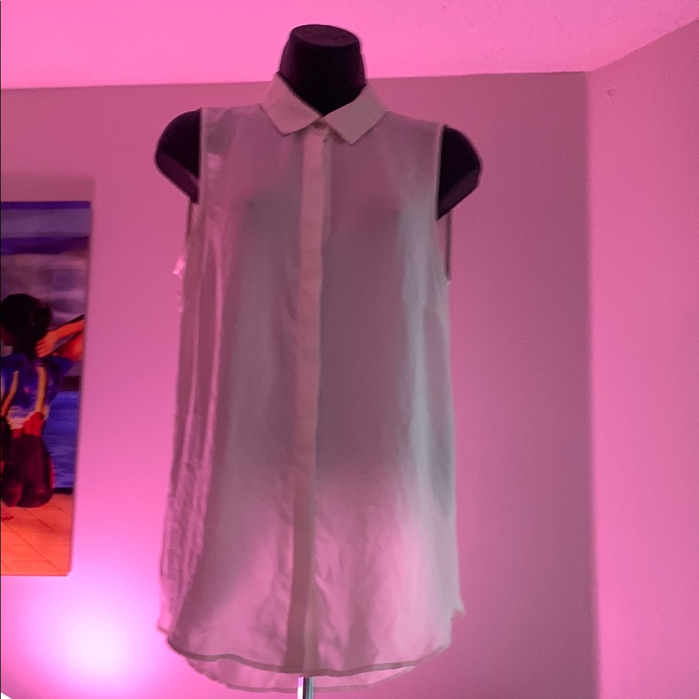 Sleeveless White Blouse